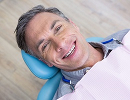 Man smiling with dental bridge in Castle Rock