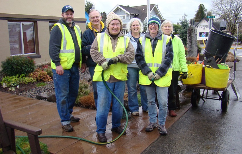 Volunteers in yellow vests