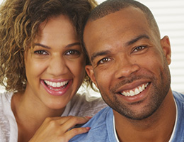 Man and woman smiling together